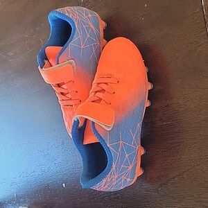 Orange and blue Soccer Cleats